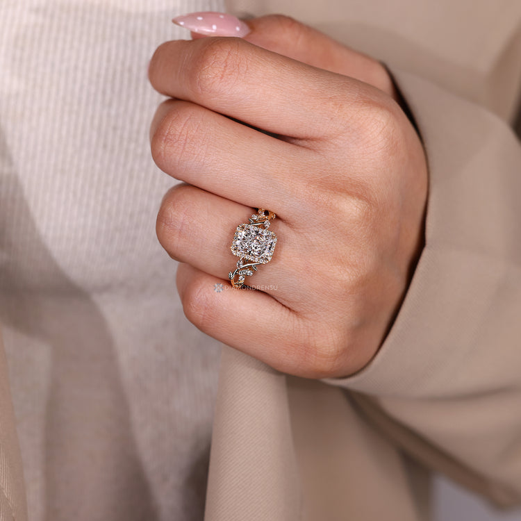 Handmade engagement ring with marquise side stones and cathedral setting.