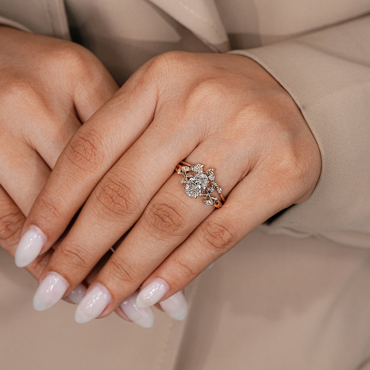 Oval diamond bridal set with a four claw prong setting.
