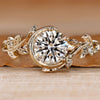 Bezel engagement ring with round center diamond.