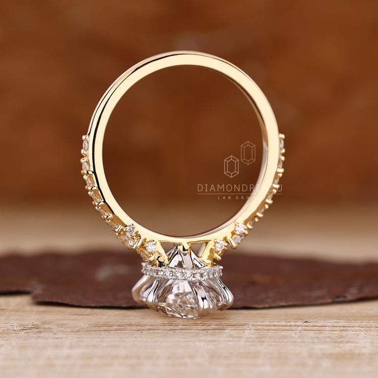 Dutch marquise ring with lab grown diamond and hidden halo design.