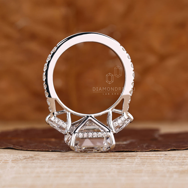 Diamondrensu handmade 10 carat emerald cut diamond ring.
