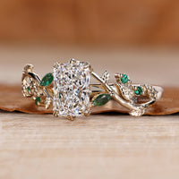 Engagement ring with six leaf style prongs.