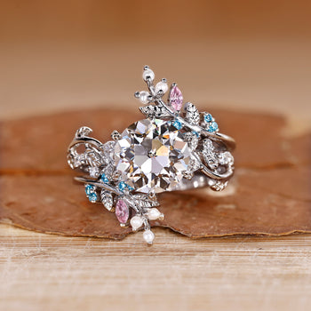 Nature inspired bridal set with round diamond ring.