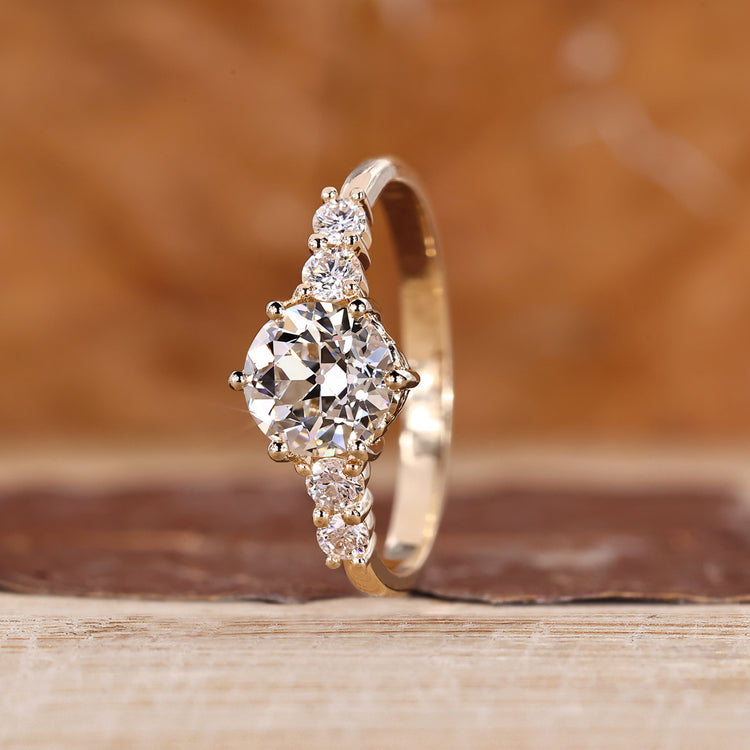 Old european cut ring with round diamond and six prong style.