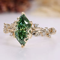 Nature inspired engagement ring with green dutch marquise and round side stones.