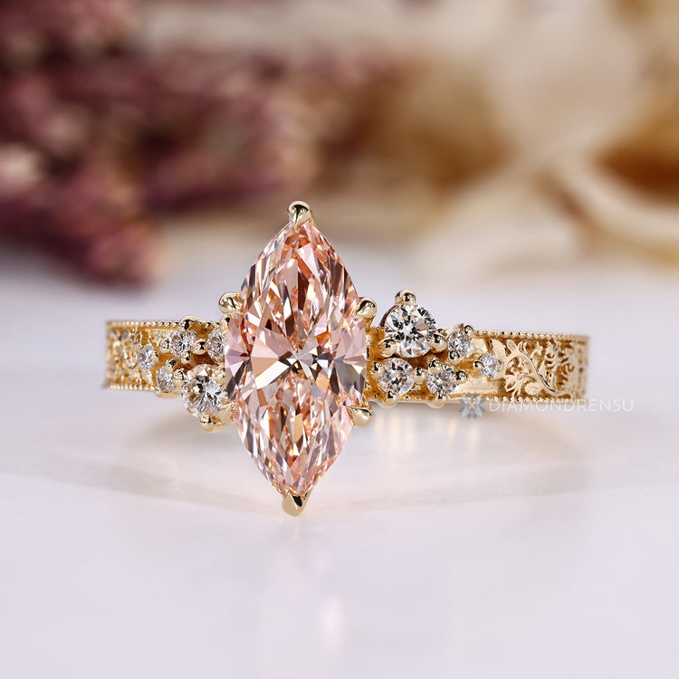 Cluster setting pairs with the round side stones.