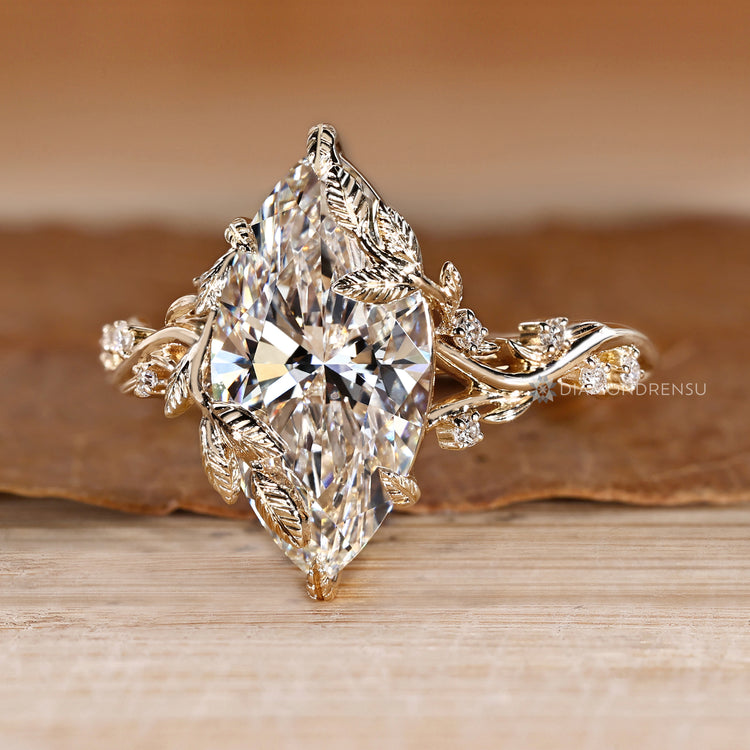 Marquise diamond ring with nature inspired details.
