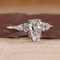 IGI certified coffin cut diamond ring with four prong setting.