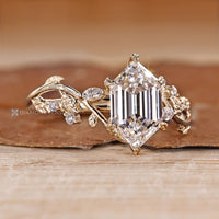 IGI certified hexagon diamond ring with leaf style prong setting.