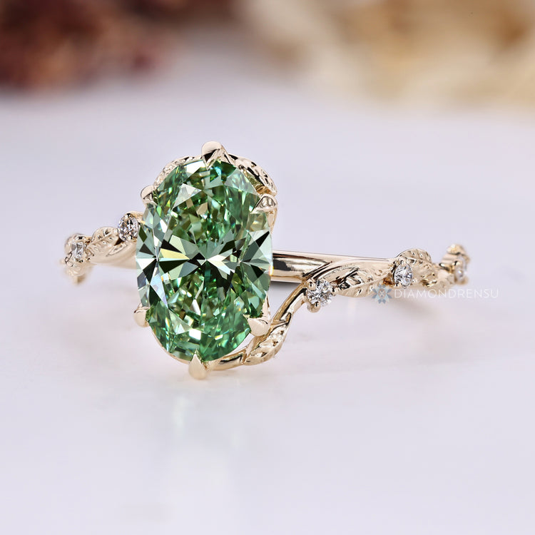 Handmade green oval engagement ring by Diamondrensu.