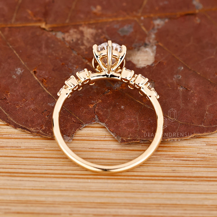 Lab grown oval diamond ring with elegant cluster style.