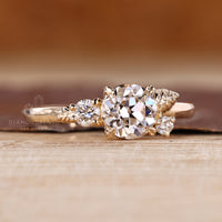 Lab grown diamond nature inspired three stone ring.
