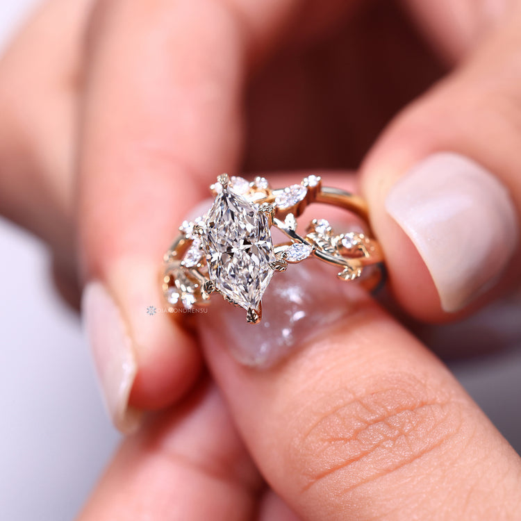 Dutch marquise engagement ring with leaf style prongs.