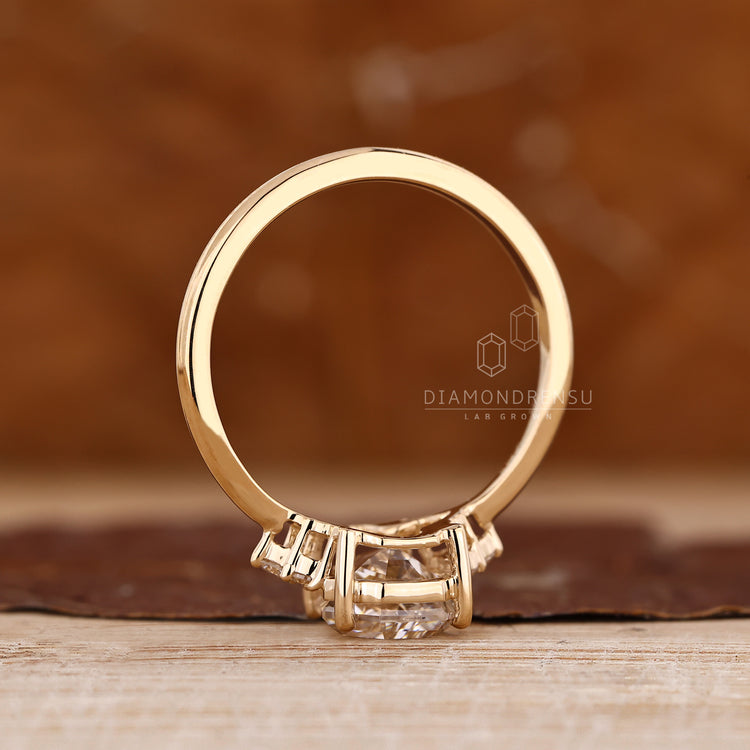 Diamondrensu handmade coffin ring with seven stone arrangement.