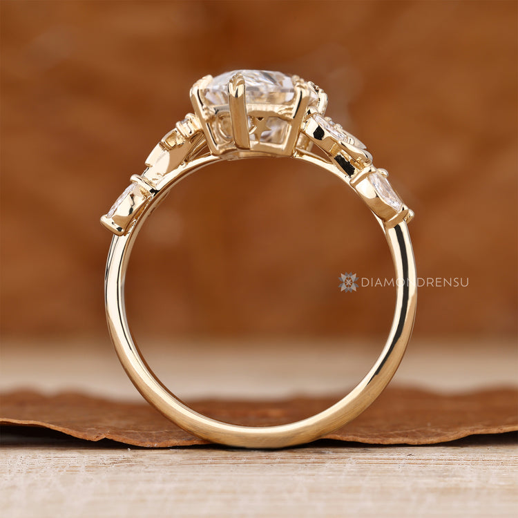 IGI certified Dutch marquise ring with round side stones.