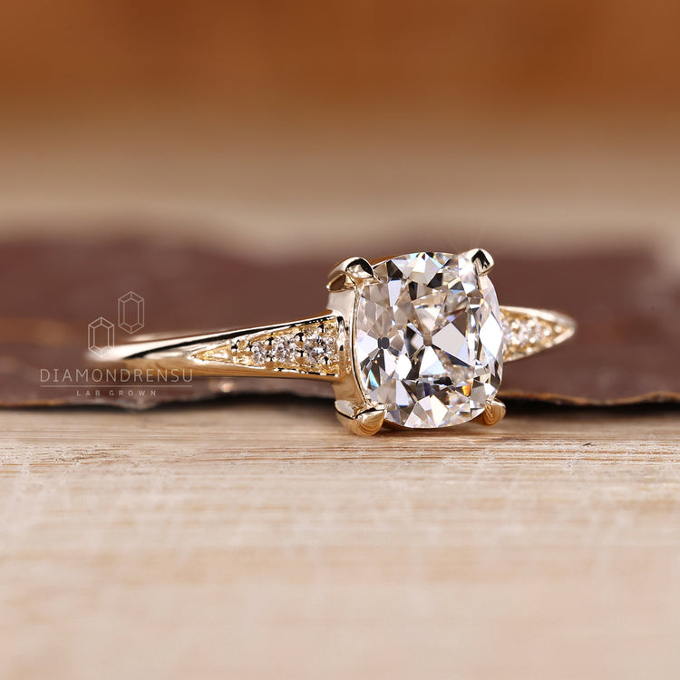 IGI Certified Old Mine Cut Diamond Ring With Cushion Center.
