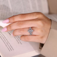 Marquise ring with muse setting and V shape band.