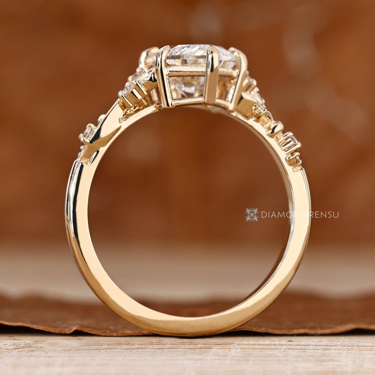 Fantasy style lab grown diamond ring with round side stones.