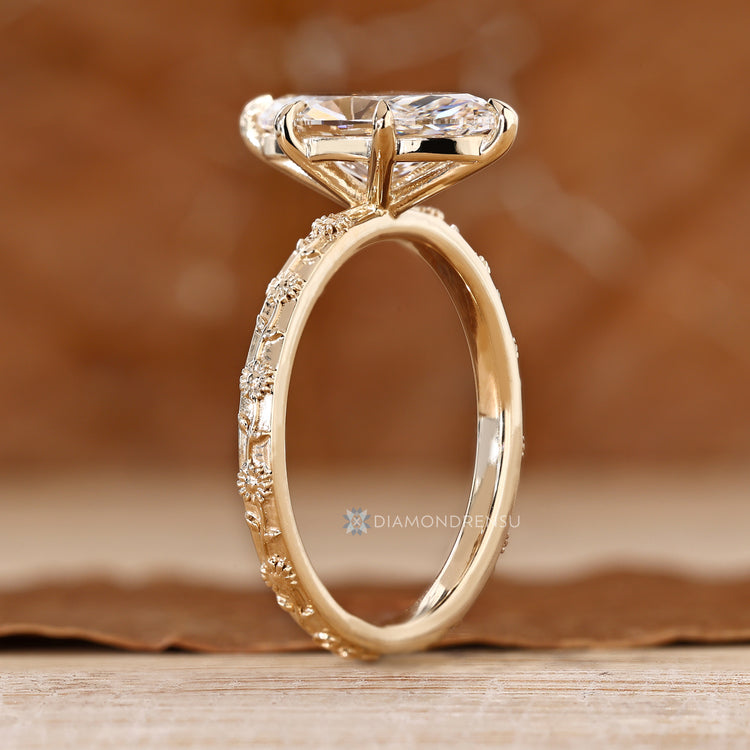 Art Deco solitaire ring with a marquise diamond.