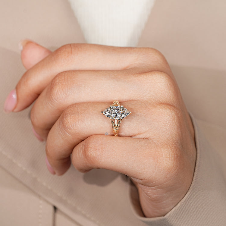 Six claw prong setting with split shank and vintage style.