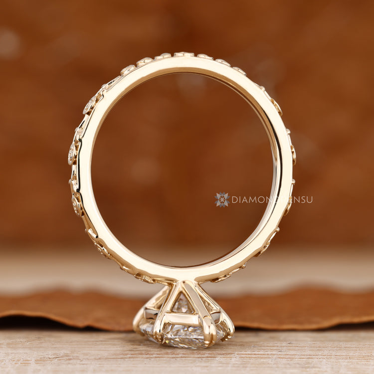 Art Deco engagement ring with a six leaf style prong setting.