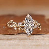 IGI certified marquise diamond ring with six leaf style prong setting.