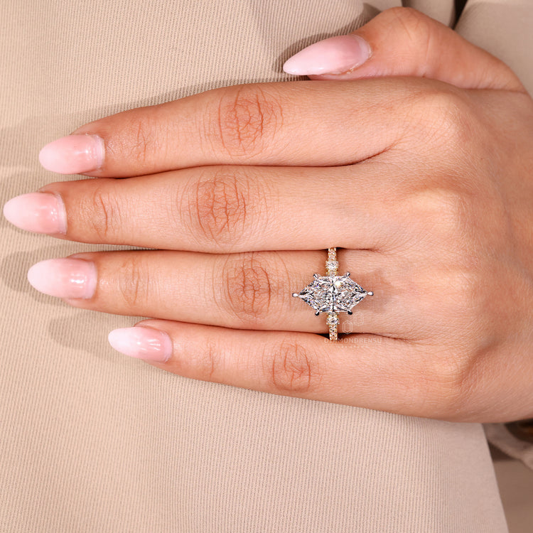 IGI certified Dutch marquise engagement ring with six claw prong setting.