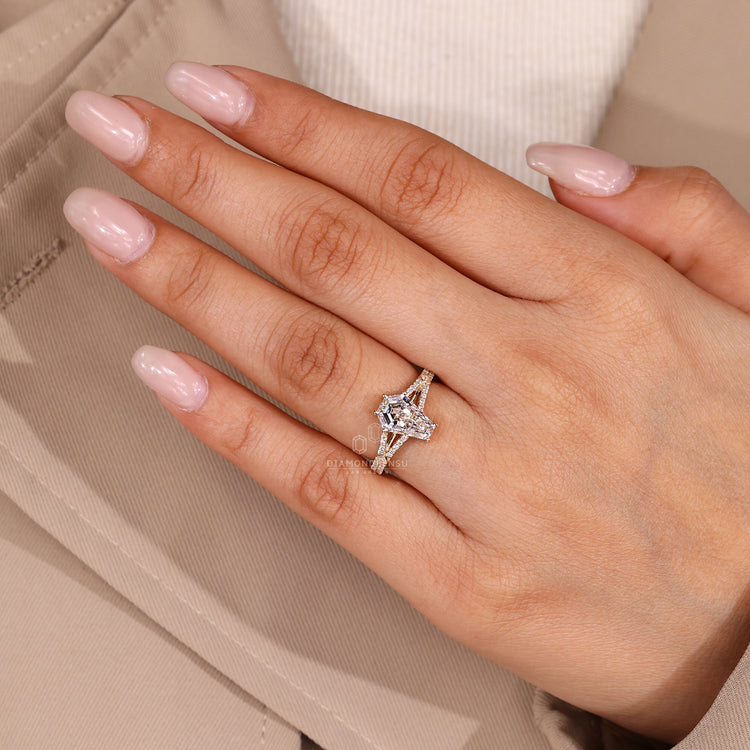 Coffin center stone ring with double row pave band.