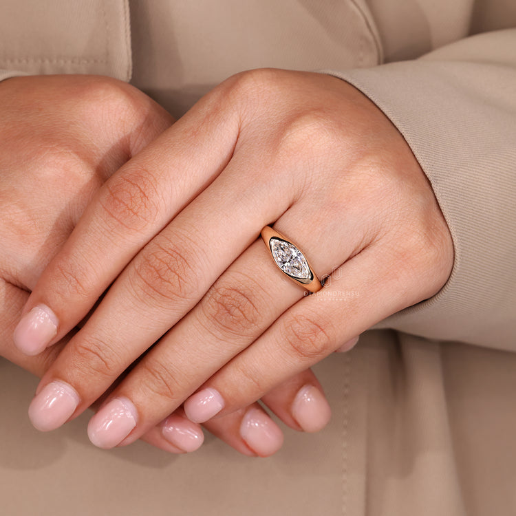 Marquise Cut Engagement Ring in Gypsy Setting