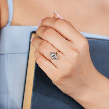 Marquise diamond ring with a split shank.