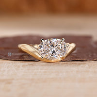 IGI certified oval cut diamond ring with pinky style design.