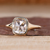 Diamondrensu solitaire ring with lab grown cushion rose cut diamond.