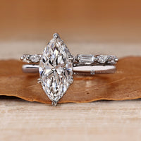Handmade marquise wedding ring with milgrain details.