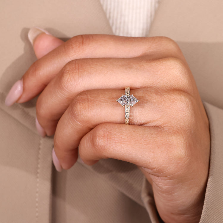 Dutch marquise ring with Art Deco band and six claw prong setting.