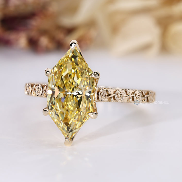 Milgrain details enhance this Art Deco diamond ring.