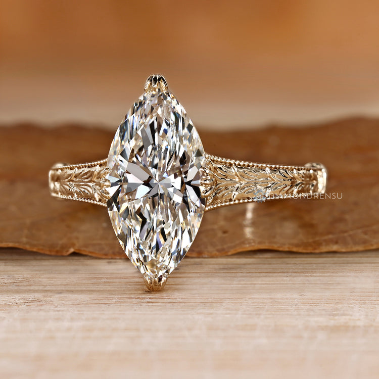 Marquise ring with a fishtail prong setting.