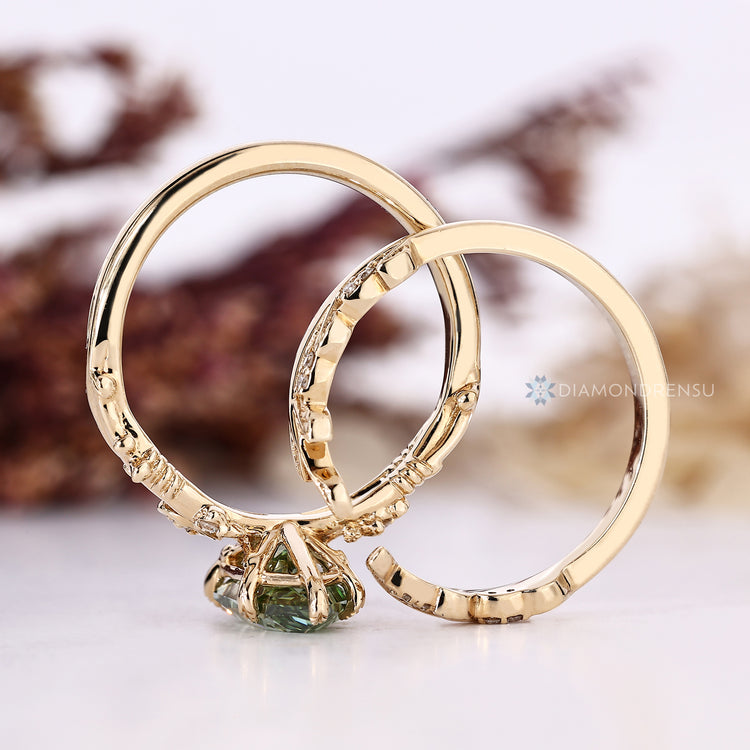 Dutch marquise bridal set with a split shank and leaf style prongs.