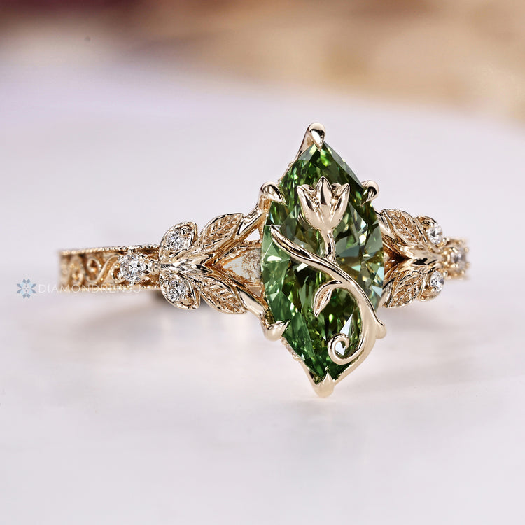 Art Deco marquise ring with a tulip setting and six claw prong setting.