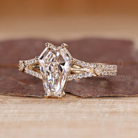 Diamondrensu coffin ring with lab grown diamond center stone.