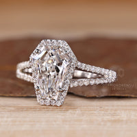 Diamondrensu split shank ring with lab grown diamond center stone.
