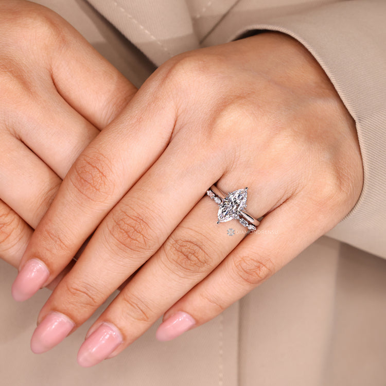 Marquise wedding ring with tulip and milgrain details.