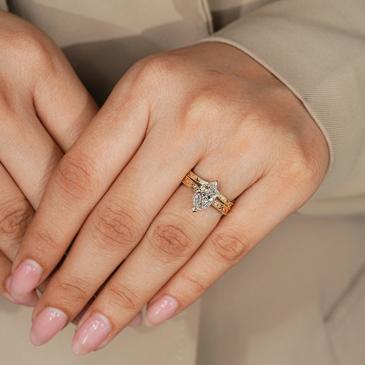 Art Deco Dutch marquise bridal set with a stackable curvy band.
