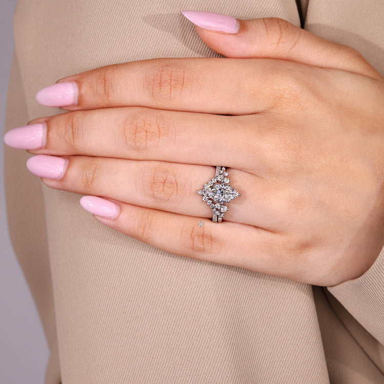 Lab grown marquise ring with pear and round diamonds.