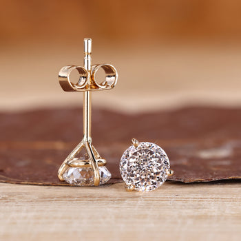 Lab grown Portuguese diamond earrings with martini style setting.
