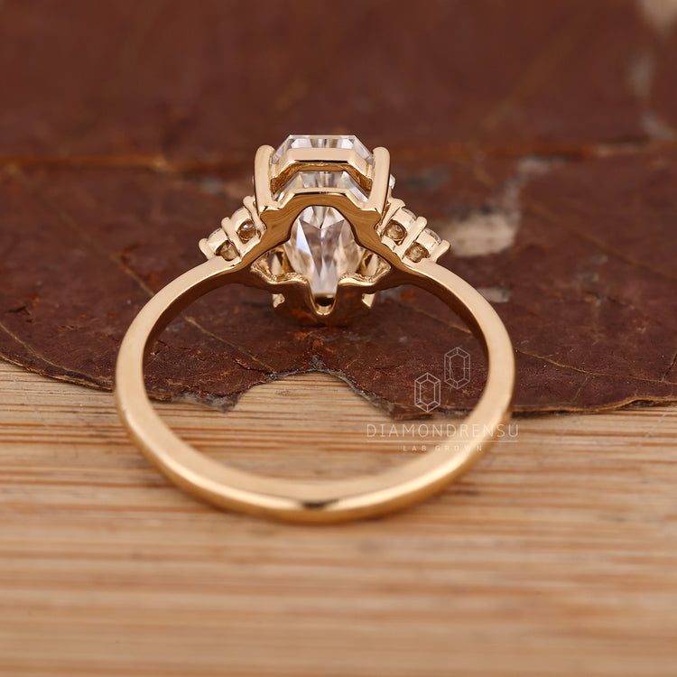 Handmade coffin ring with tapered shank and muse setting.