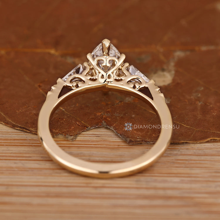 IGI certified lab grown diamond with four claw prong setting.