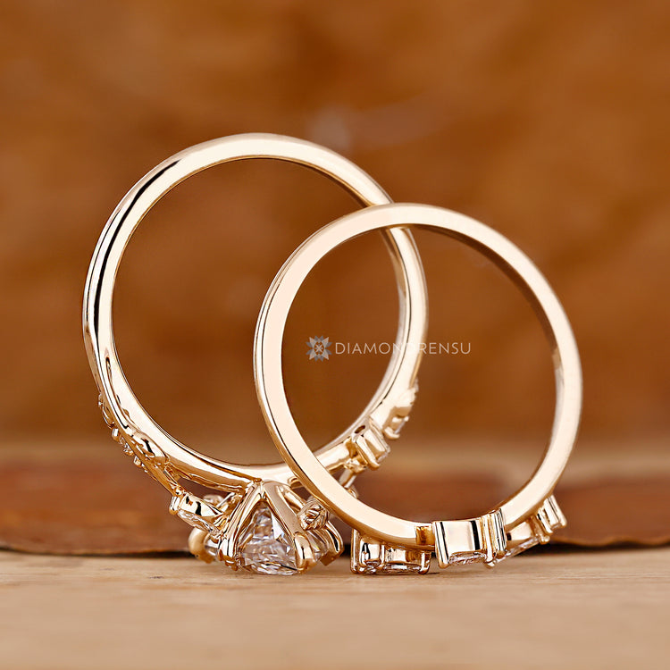 Handmade engagement ring with leaf details and tiara band.