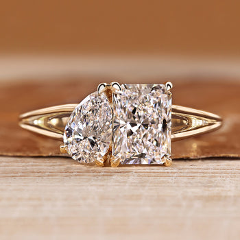 Two stone engagement ring with pear and radiant stones.