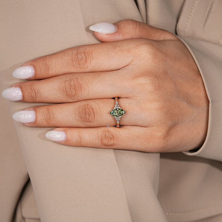 Diamondrensu handmade Art Deco diamond ring with a green marquise center stone.