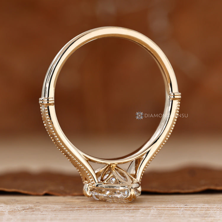 Art Deco marquise diamond ring with a fishtail prong setting.